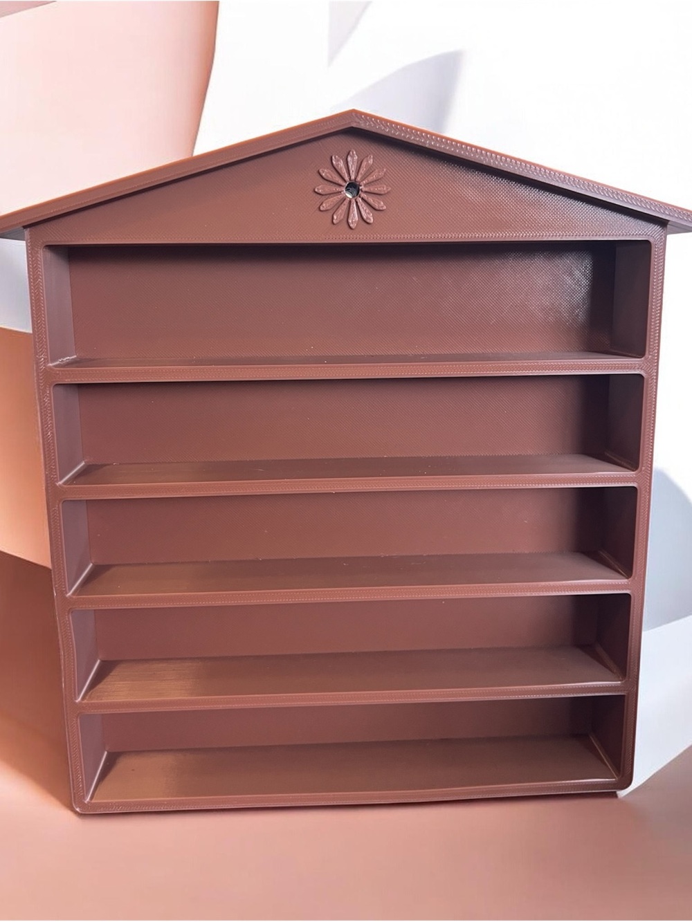 Mini trinket bookshelf 5 shelves. Made of brown plastic 9”x7-1/2”